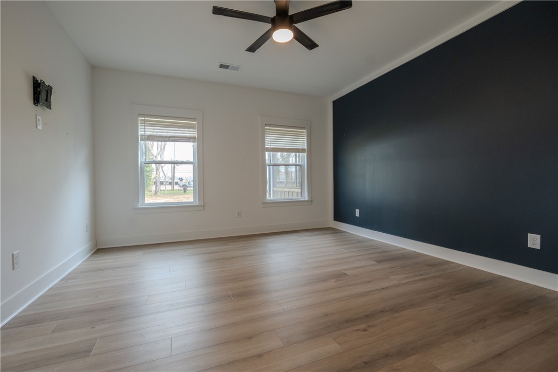 203 Mr Jim's Lane Clinton, SC 29325 - Photo 15 of 28 This airy room offers a comfortable and inviting atmosphere, perfect for everyday living.
