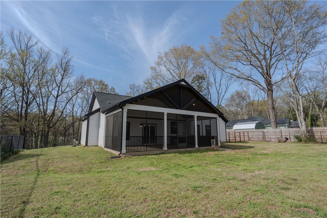203 Mr Jim's Lane Clinton, SC 29325 - Photo 25 of 28 This residence features a screened porch overlooking a spacious yard.