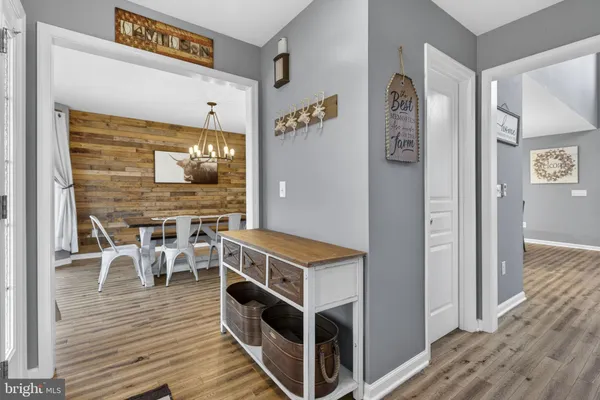 a view of a room that has a window and storage space