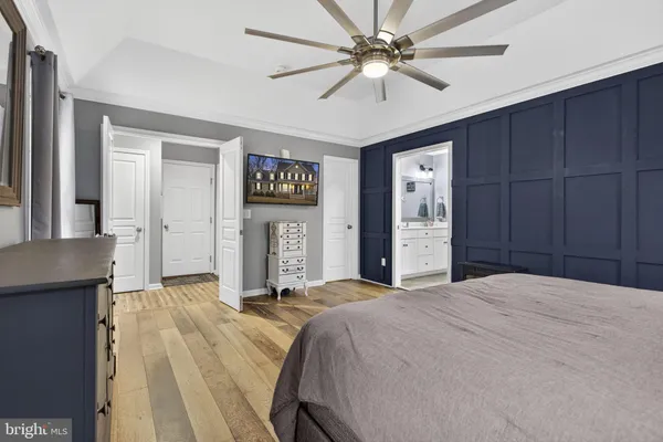 a view of a house with a chairs and table in a patio