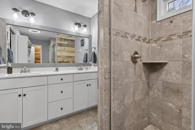 a view of a house with a yard and garage