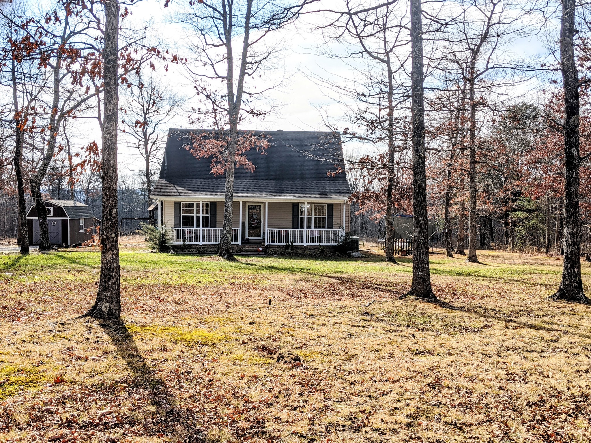 642 Meyers Road Altamont, TN 37301 - Photo 1 of 33 a view of a house with a yard covered in snow