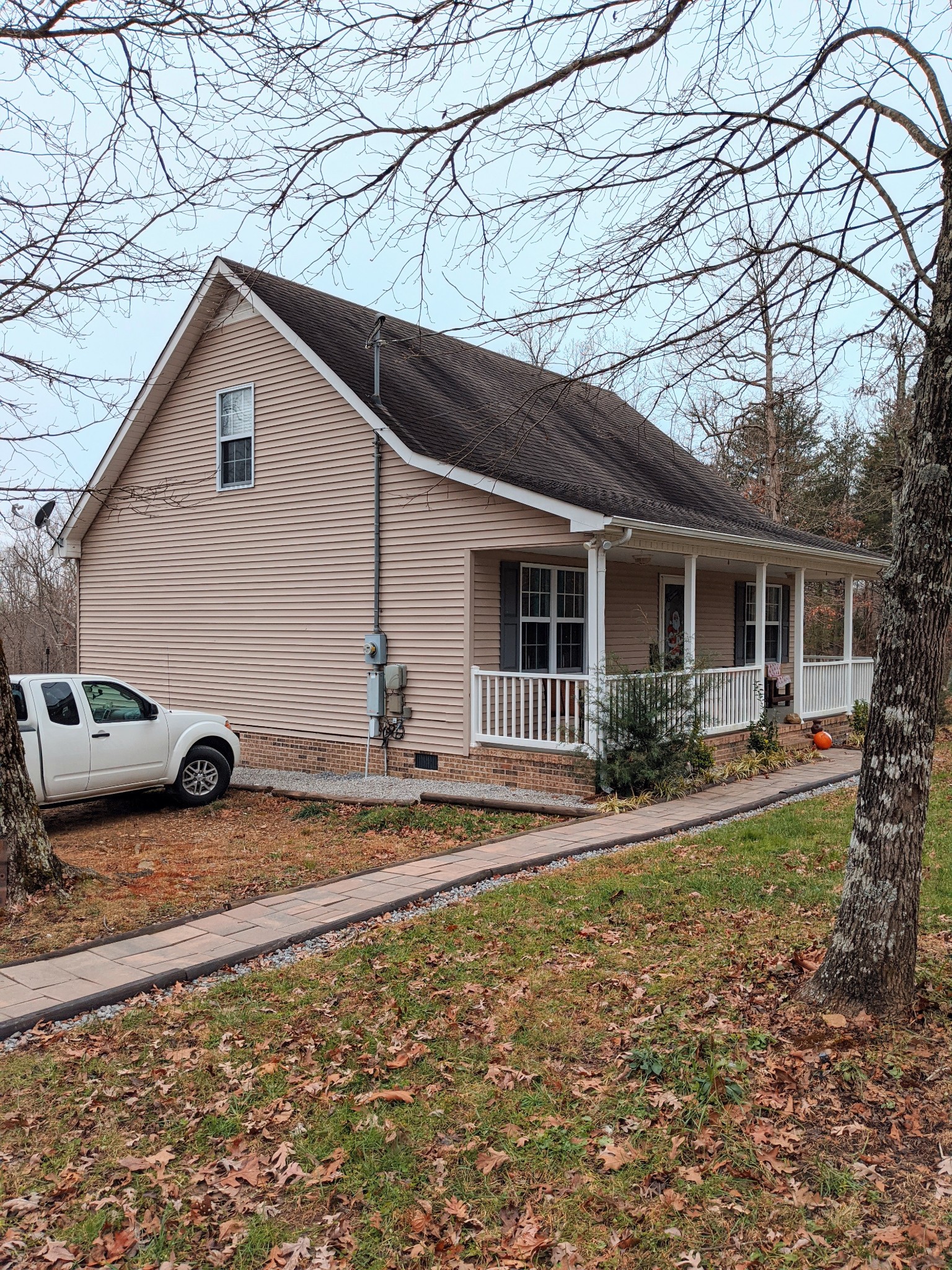 642 Meyers Road Altamont, TN 37301 - Photo 22 of 33 a front view of a house with garden