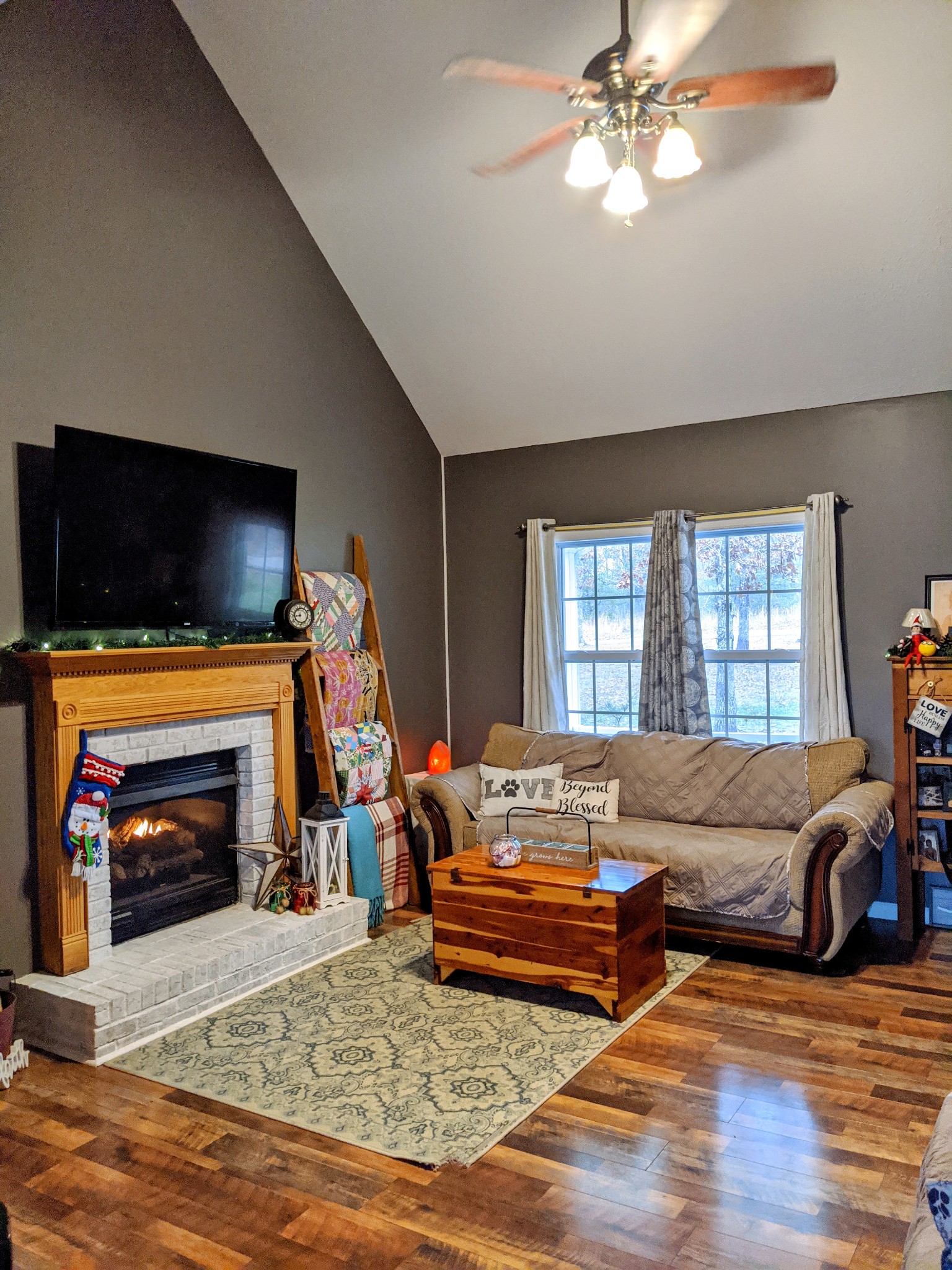 642 Meyers Road Altamont, TN 37301 - Photo 7 of 33 a living room with furniture a flat screen tv and a fireplace