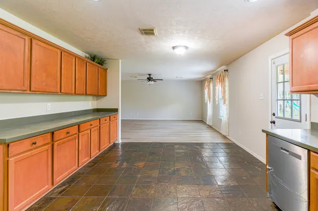 a view of a hallway with closet