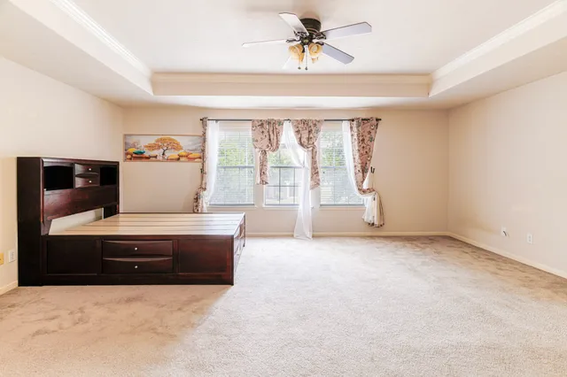 a room with a stove and a refrigerator