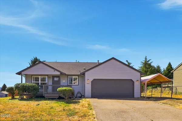 a front view of a house with garden