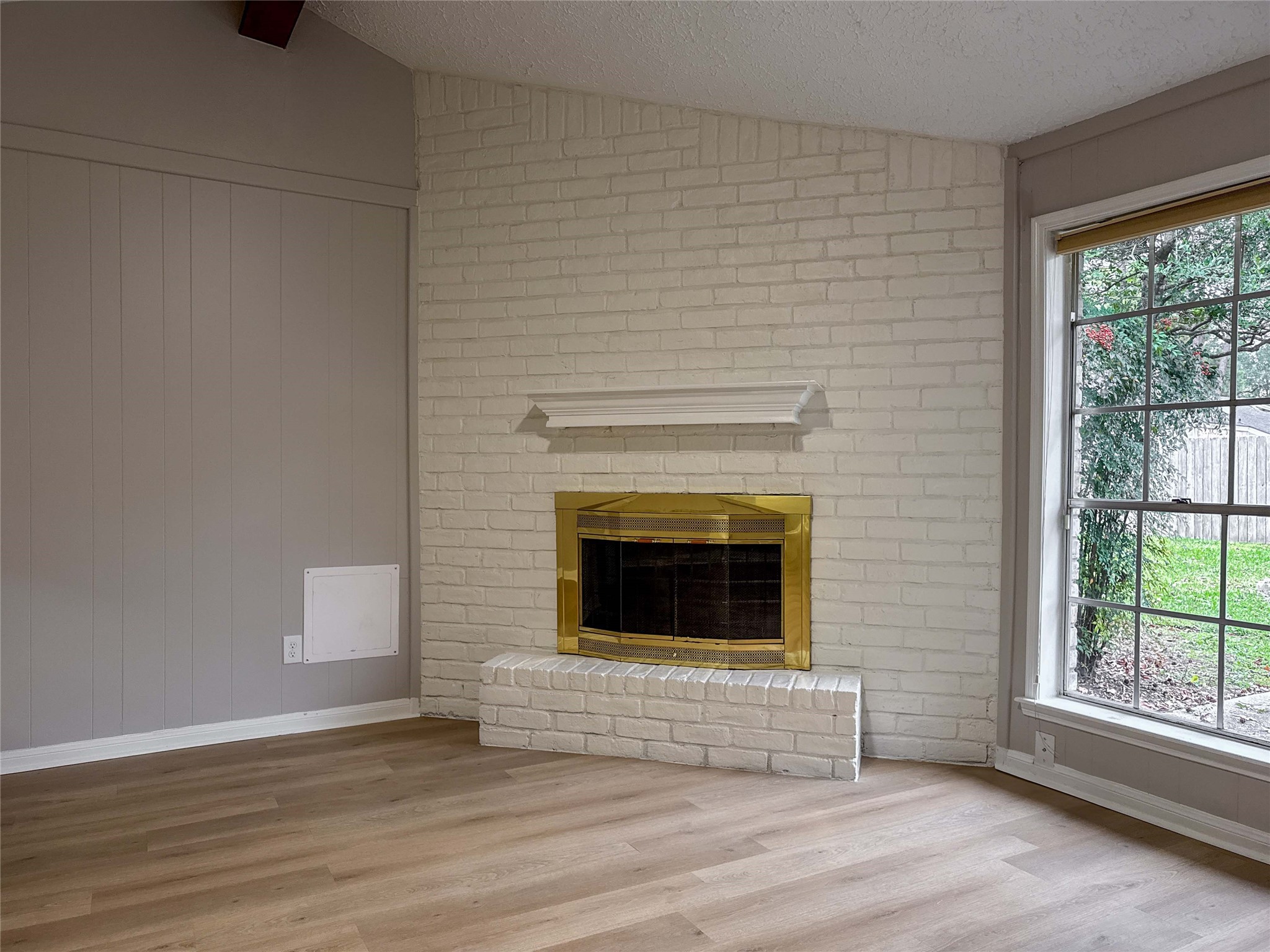 22822 Canyon Lake Drive Spring, TX 77373 - Photo 5 of 26 a view of an empty room with wooden floor and a window