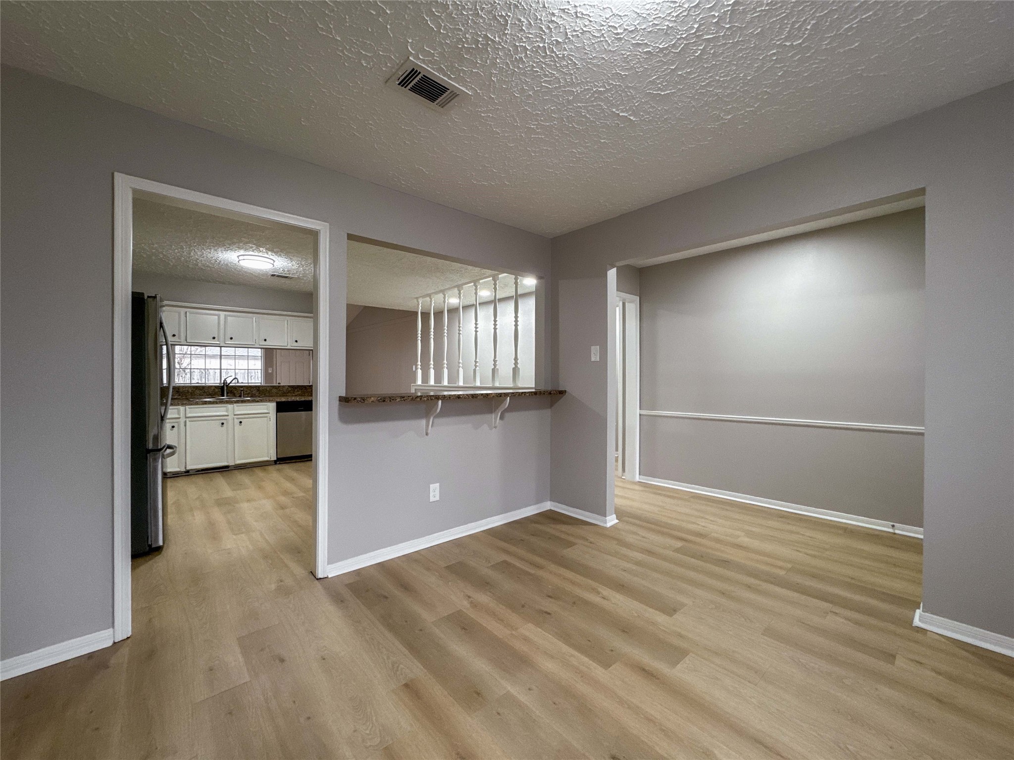 22822 Canyon Lake Drive Spring, TX 77373 - Photo 9 of 26 a view of a livingroom with wooden floor