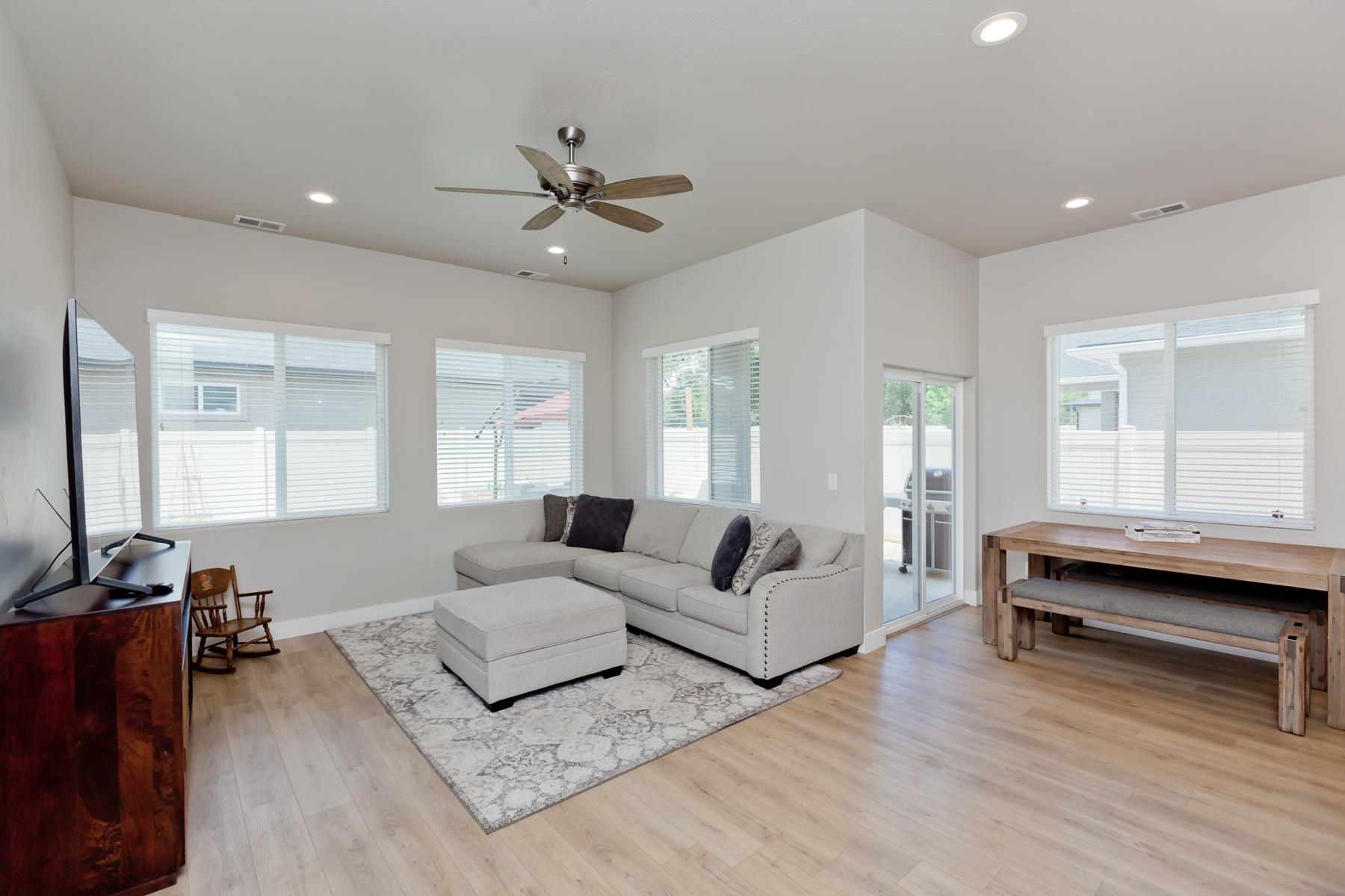 628 Thunder Ridge Drive Grand Junction, CO 81504 - Photo 11 of 37 a living room with furniture and a large window