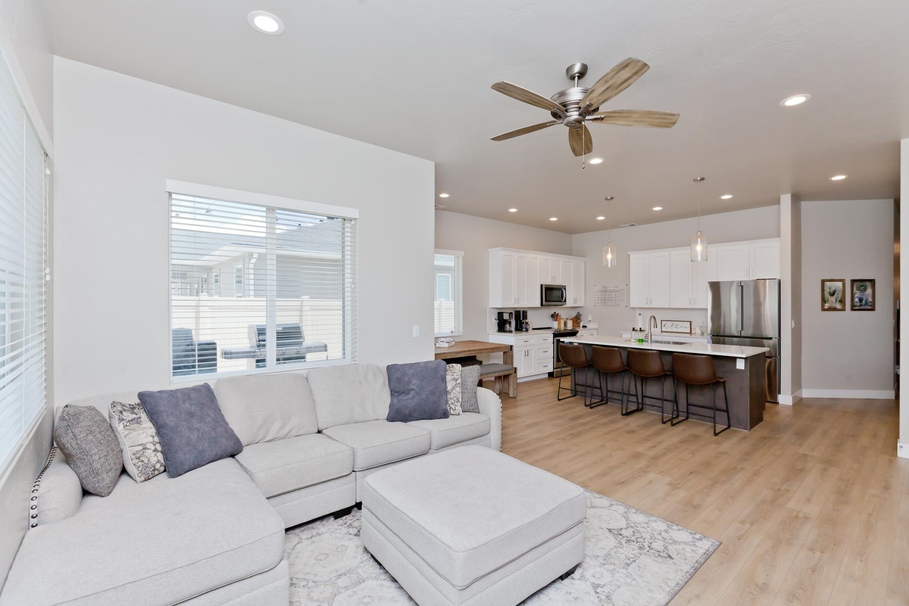 628 Thunder Ridge Drive Grand Junction, CO 81504 - Photo 12 of 37 a living room with furniture kitchen view and a window