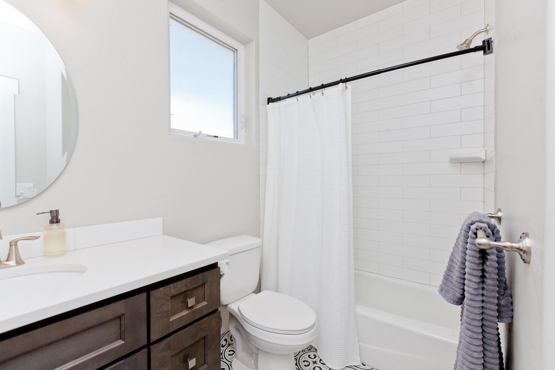 628 Thunder Ridge Drive Grand Junction, CO 81504 - Photo 20 of 37 a bathroom with a sink toilet and shower