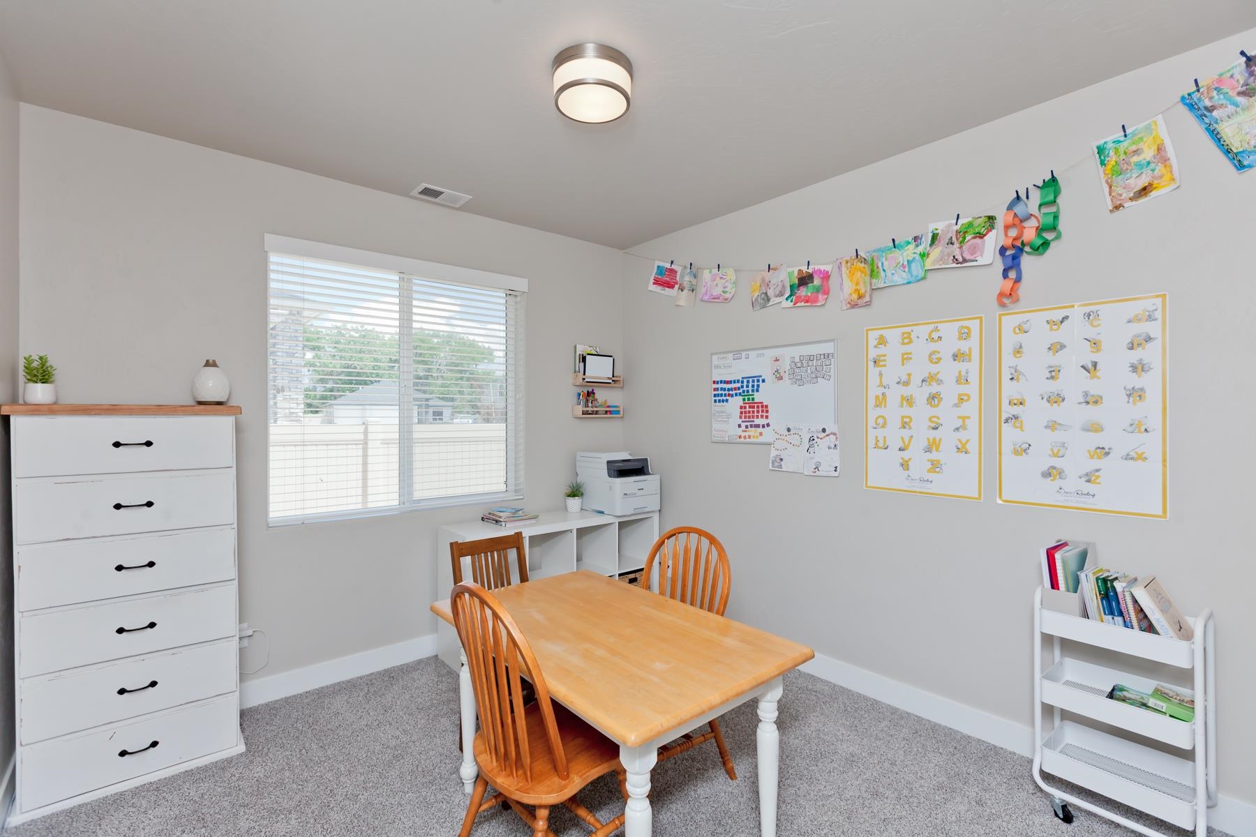 628 Thunder Ridge Drive Grand Junction, CO 81504 - Photo 26 of 37 a view of a play room with furniture