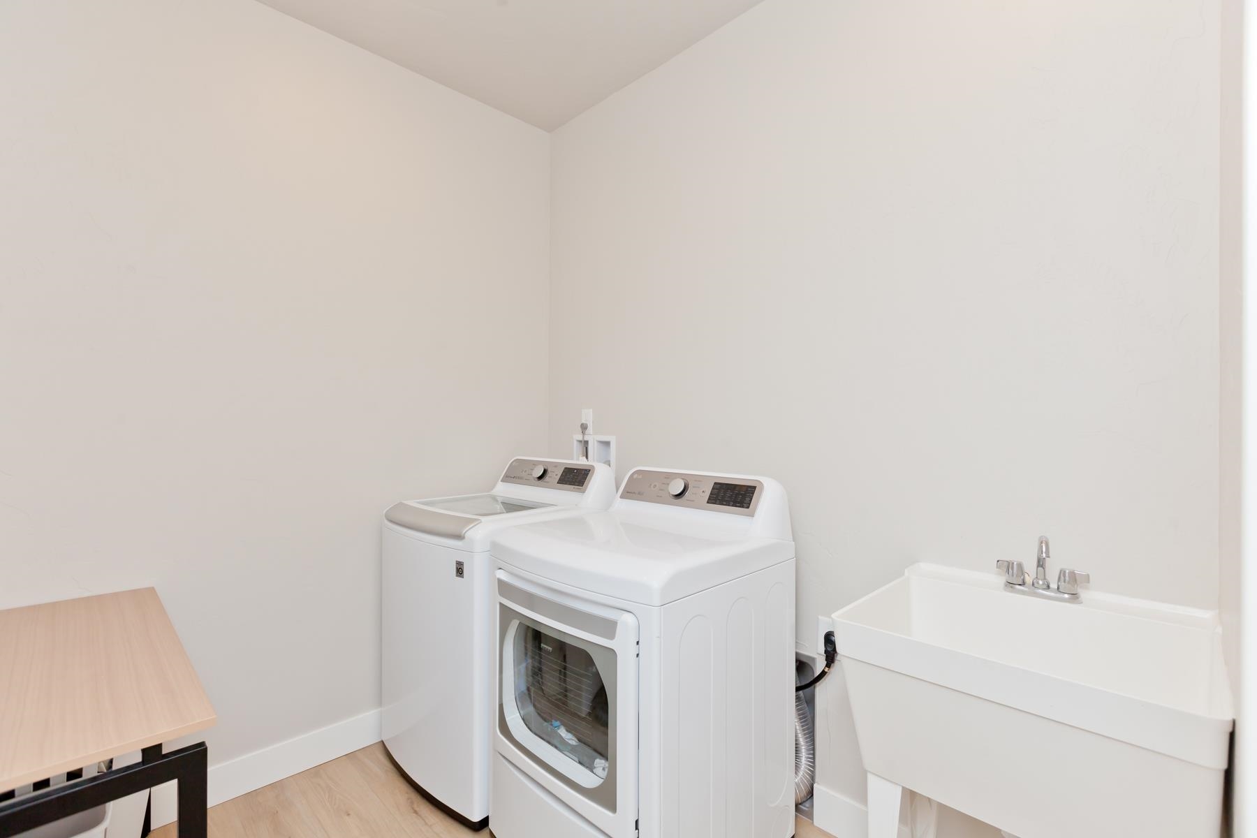 628 Thunder Ridge Drive Grand Junction, CO 81504 - Photo 28 of 37 a utility room with dryer and washer