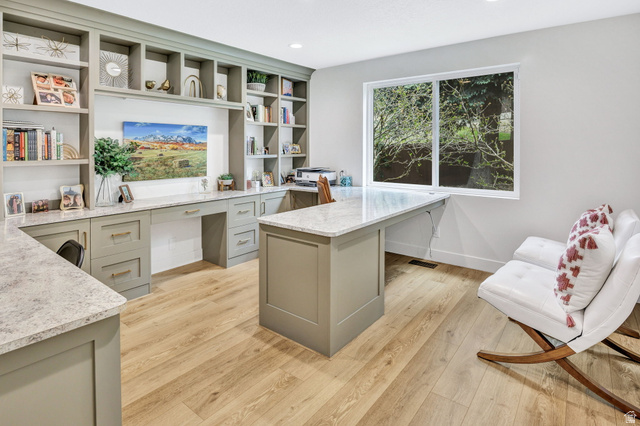 1350 Canyon Park Road Bountiful, UT 84010 - Photo 25 of 38 Dedicated workspace featuring extensive built-in cabinetry, substantial counter surfaces, wood-finish flooring, a generous window, and recessed lighting