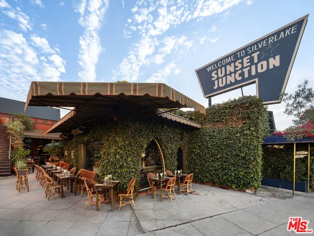 a view of a chairs and table in patio