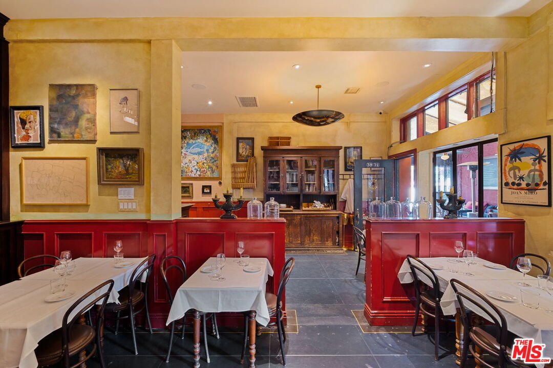 3924 Sunset Boulevard Los Angeles, CA 90029 - Photo 42 of 70 a view of a dining room with furniture and chandelier