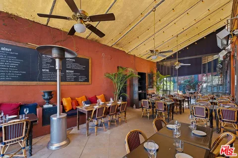a bathroom with a sink vanity and a mirror