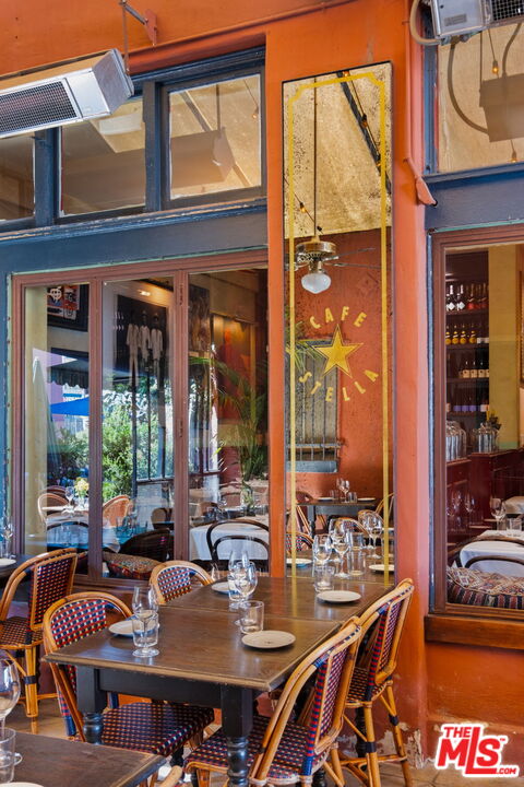3924 Sunset Boulevard Los Angeles, CA 90029 - Photo 46 of 70 a view of a patio with dining table and chairs