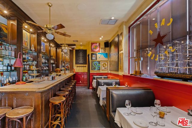 a view of a balcony with a car park