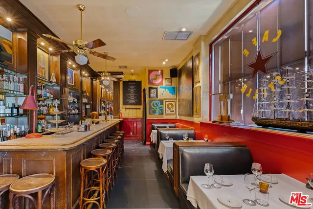 a view of a balcony with a car park