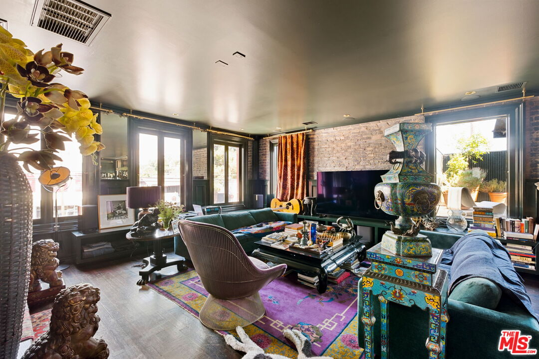 3924 Sunset Boulevard Los Angeles, CA 90029 - Photo 57 of 70 a living room with furniture fireplace and a large window
