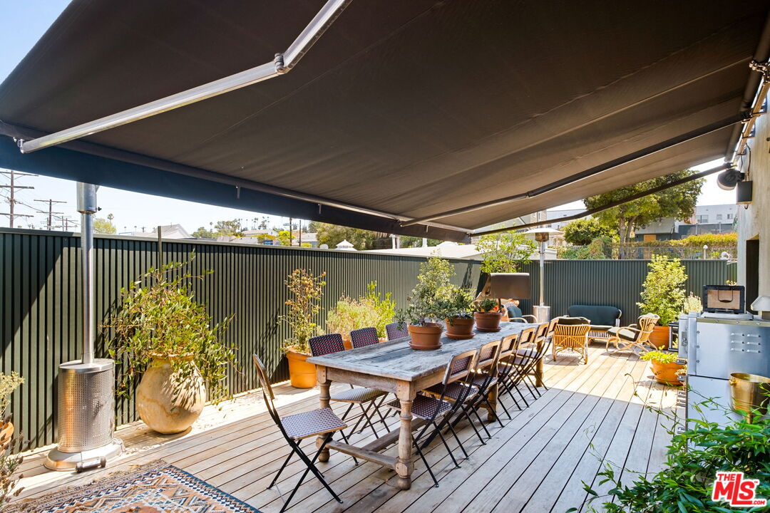 3924 Sunset Boulevard Los Angeles, CA 90029 - Photo 65 of 70 a dining room with furniture and wooden floor