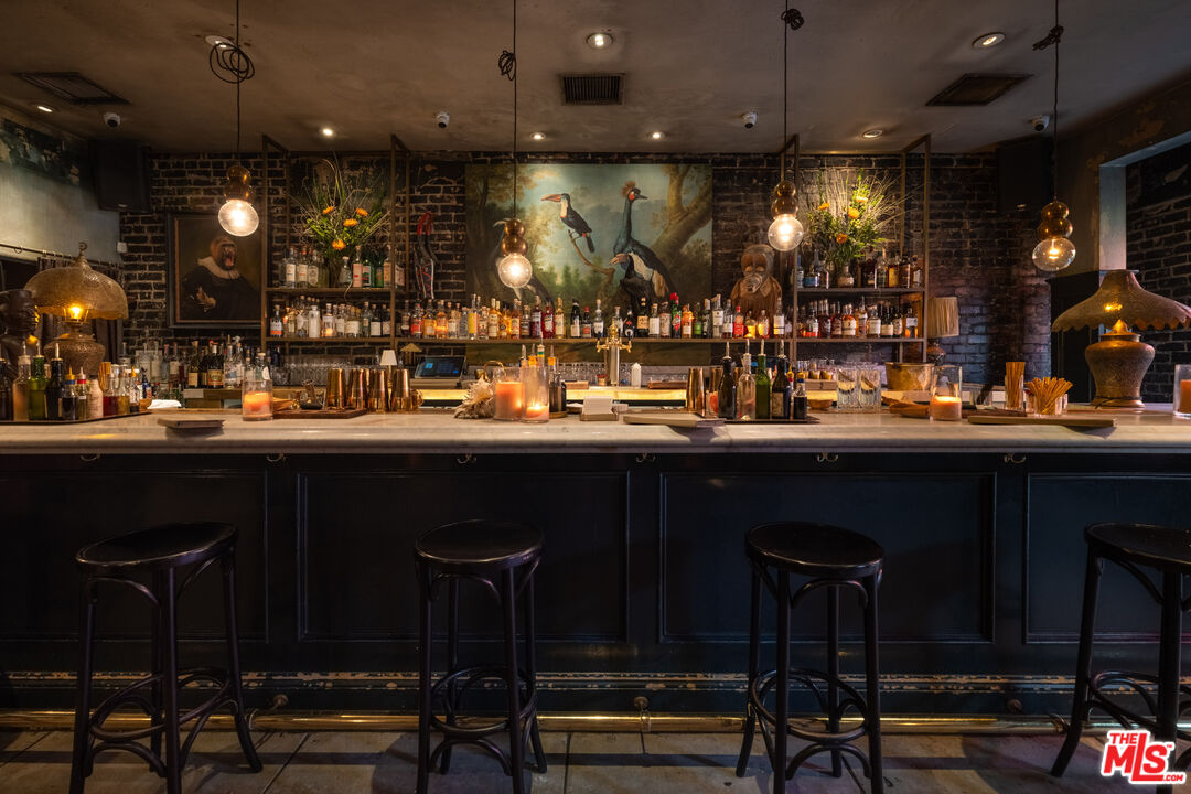 3924 Sunset Boulevard Los Angeles, CA 90029 - Photo 7 of 70 a kitchen with a table and chairs in it