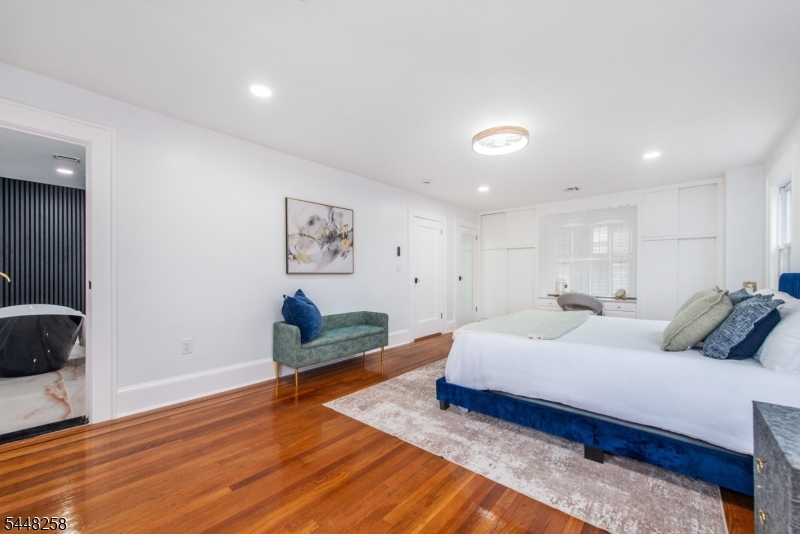 570 Cameron Road South Orange, NJ 07079 - Photo 16 of 32 a bedroom with furniture and a wooden floor