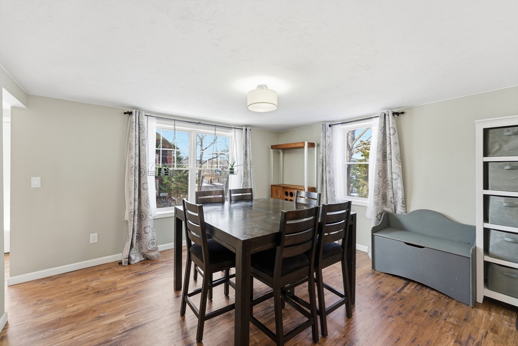 160 Cottage Street Athol, MA 01331 - Photo 9 of 35 a view of a dining room with furniture and wooden floor