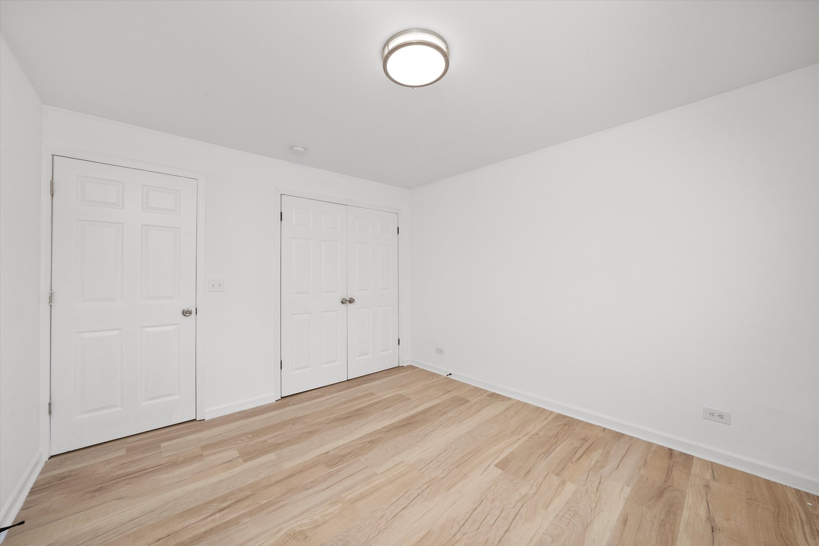 14732 Turner Avenue, Unit D Midlothian, IL 60445 - Photo 15 of 28 a view of a room with wooden floor and window