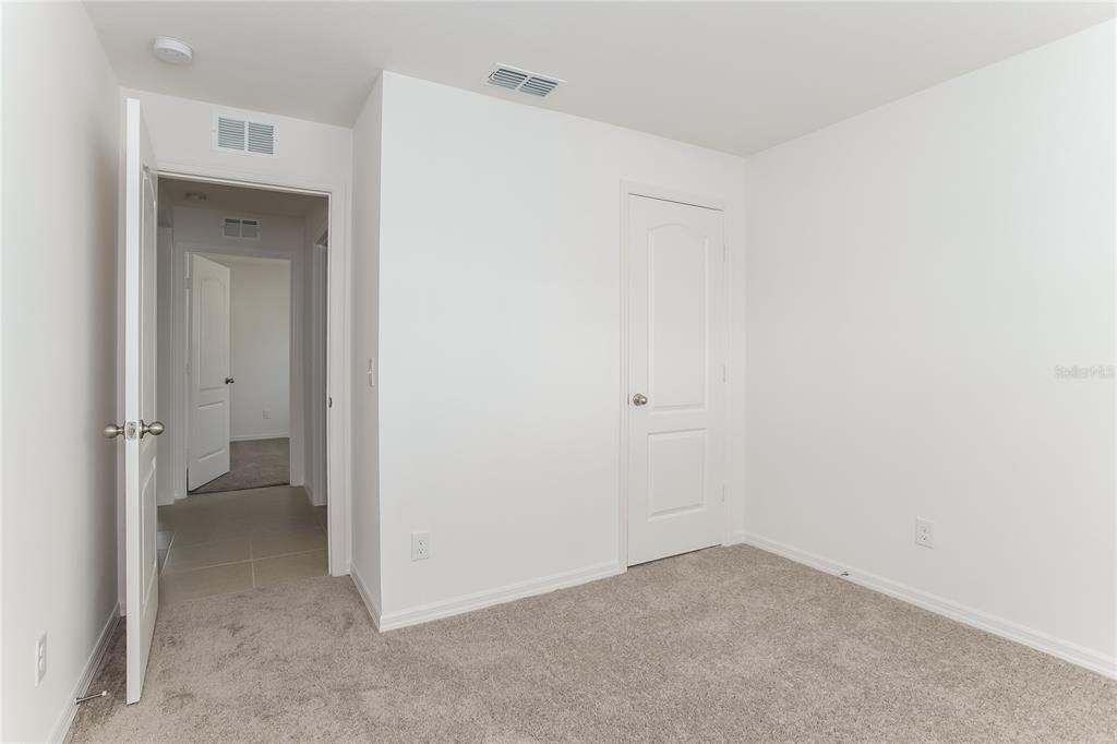 1724 Canaan Loop Dundee, FL 33838 - Photo 12 of 16 a view of an empty room