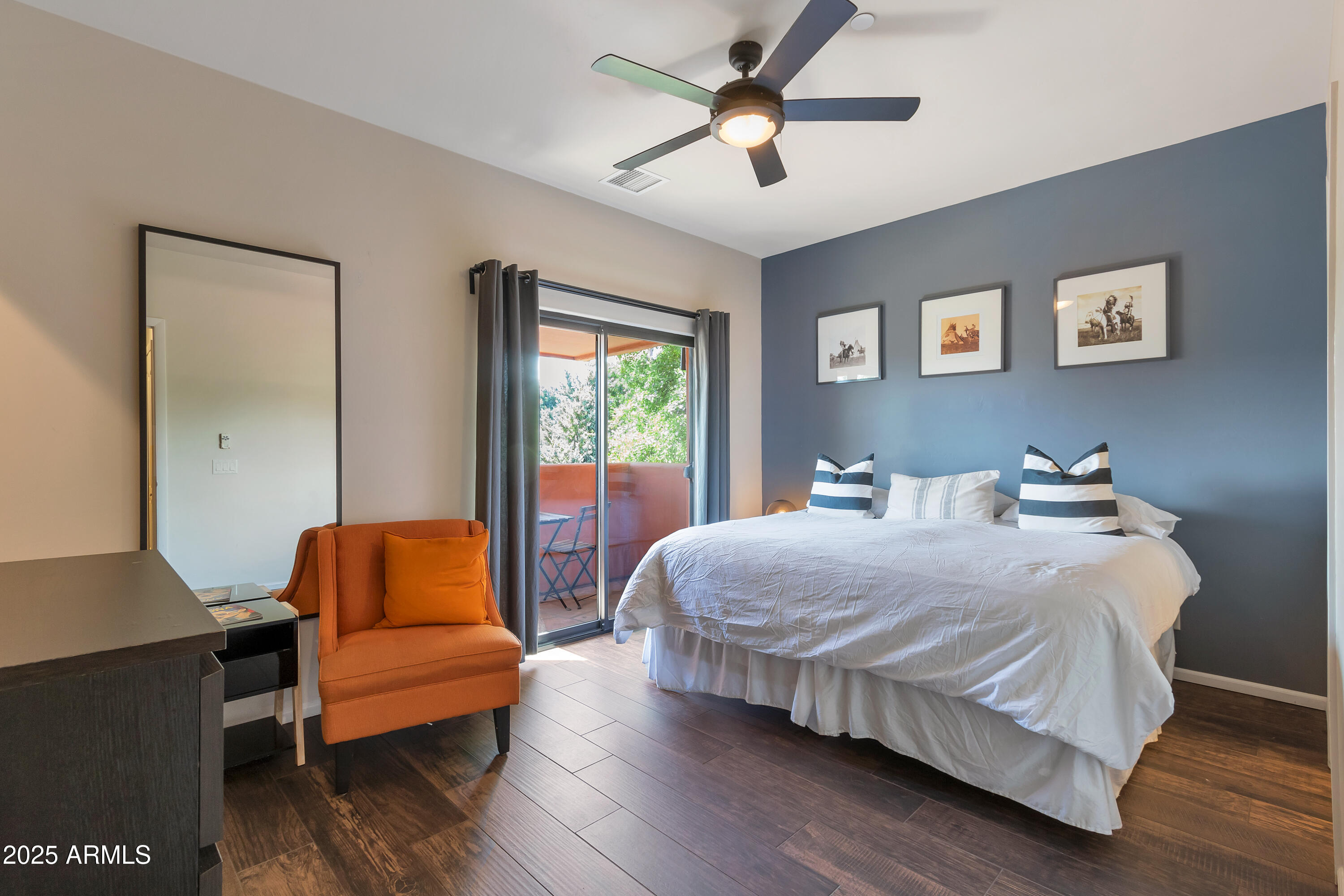 45 Canyon Diablo Road, Unit 5 Sedona, AZ 86351 - Photo 13 of 25 a bedroom with a bed couch and a window