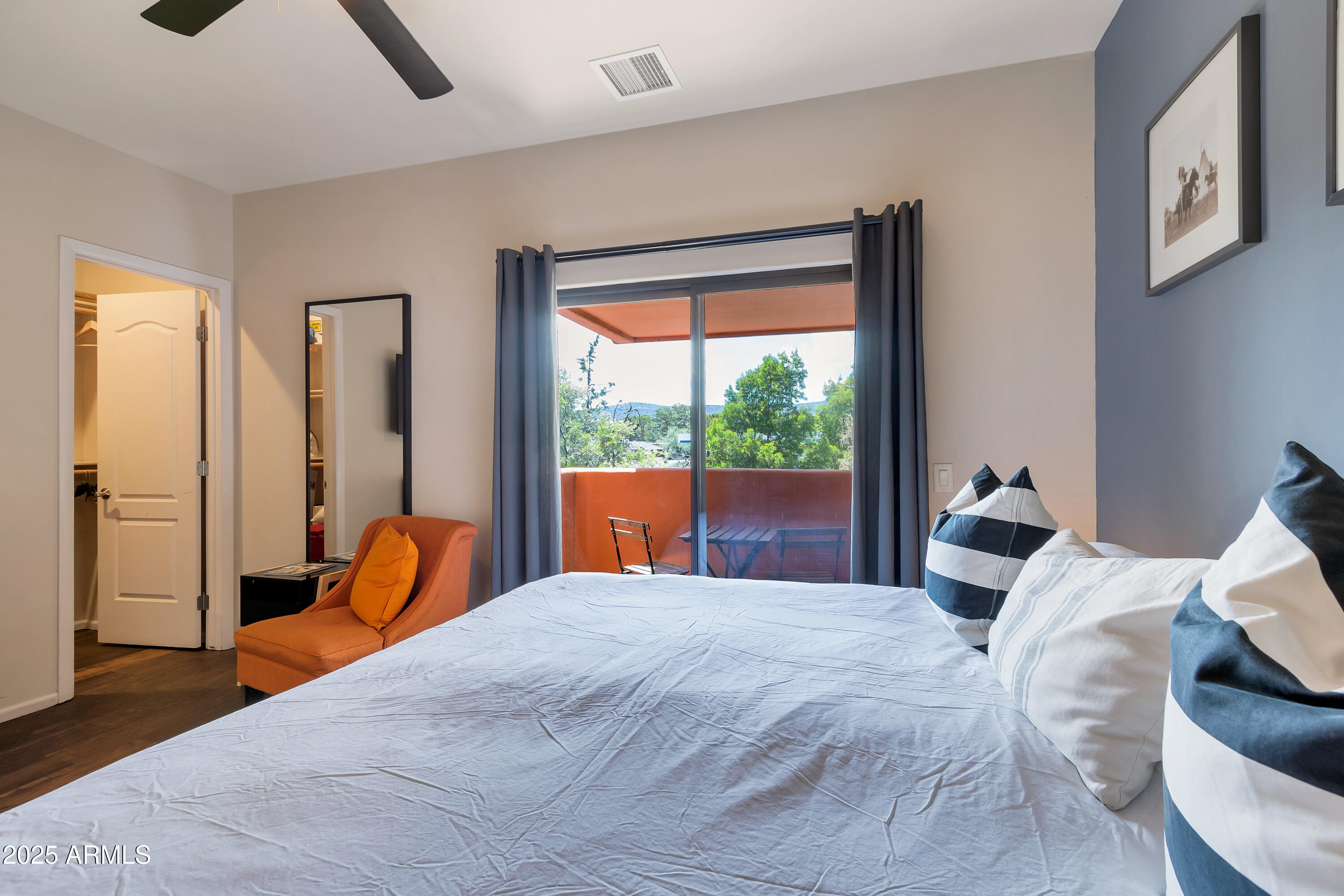 45 Canyon Diablo Road, Unit 5 Sedona, AZ 86351 - Photo 14 of 25 a bedroom with a bed and a large window