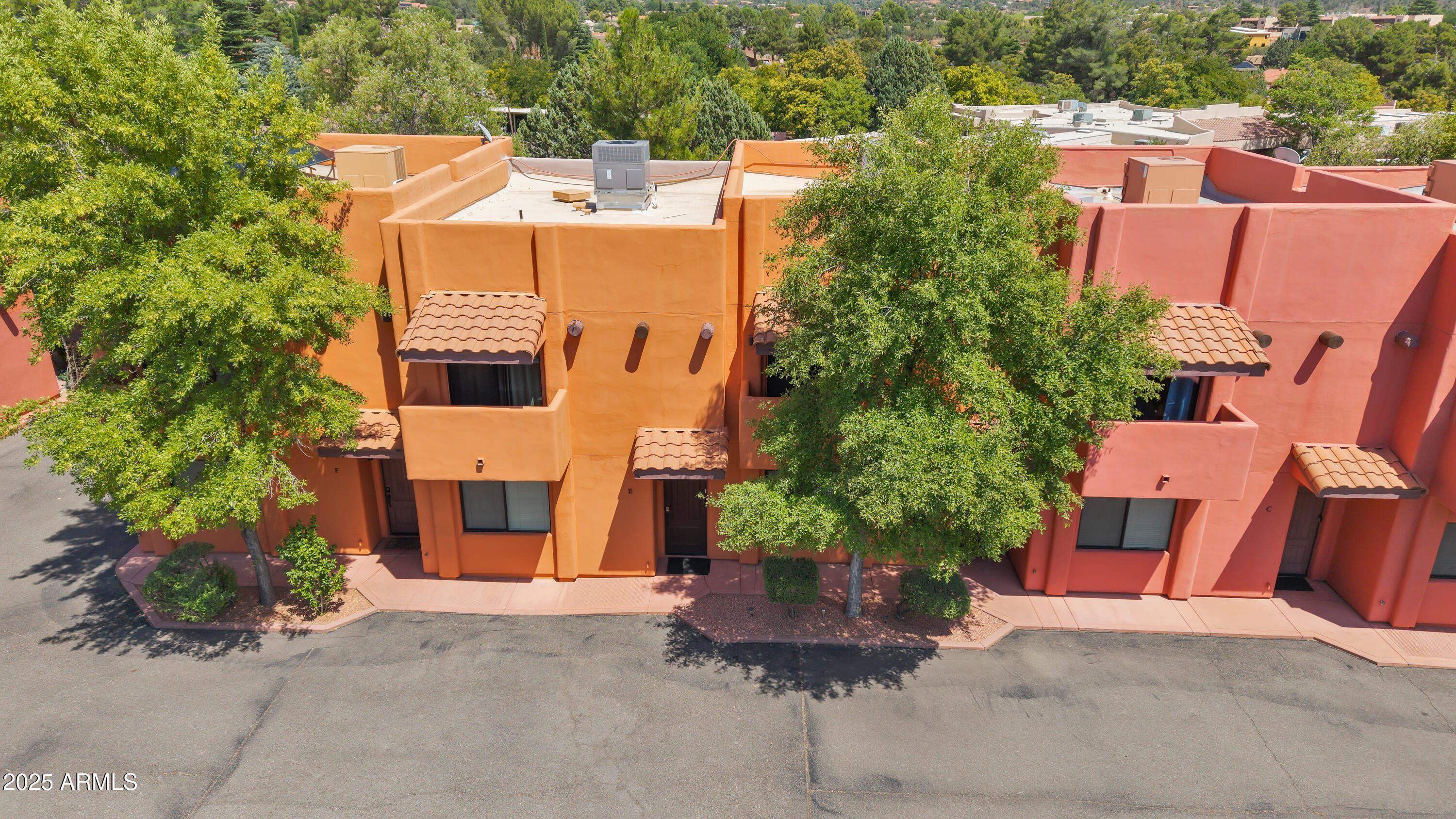 45 Canyon Diablo Road, Unit 5 Sedona, AZ 86351 - Photo 2 of 25 a aerial view of a house with a yard and garage
