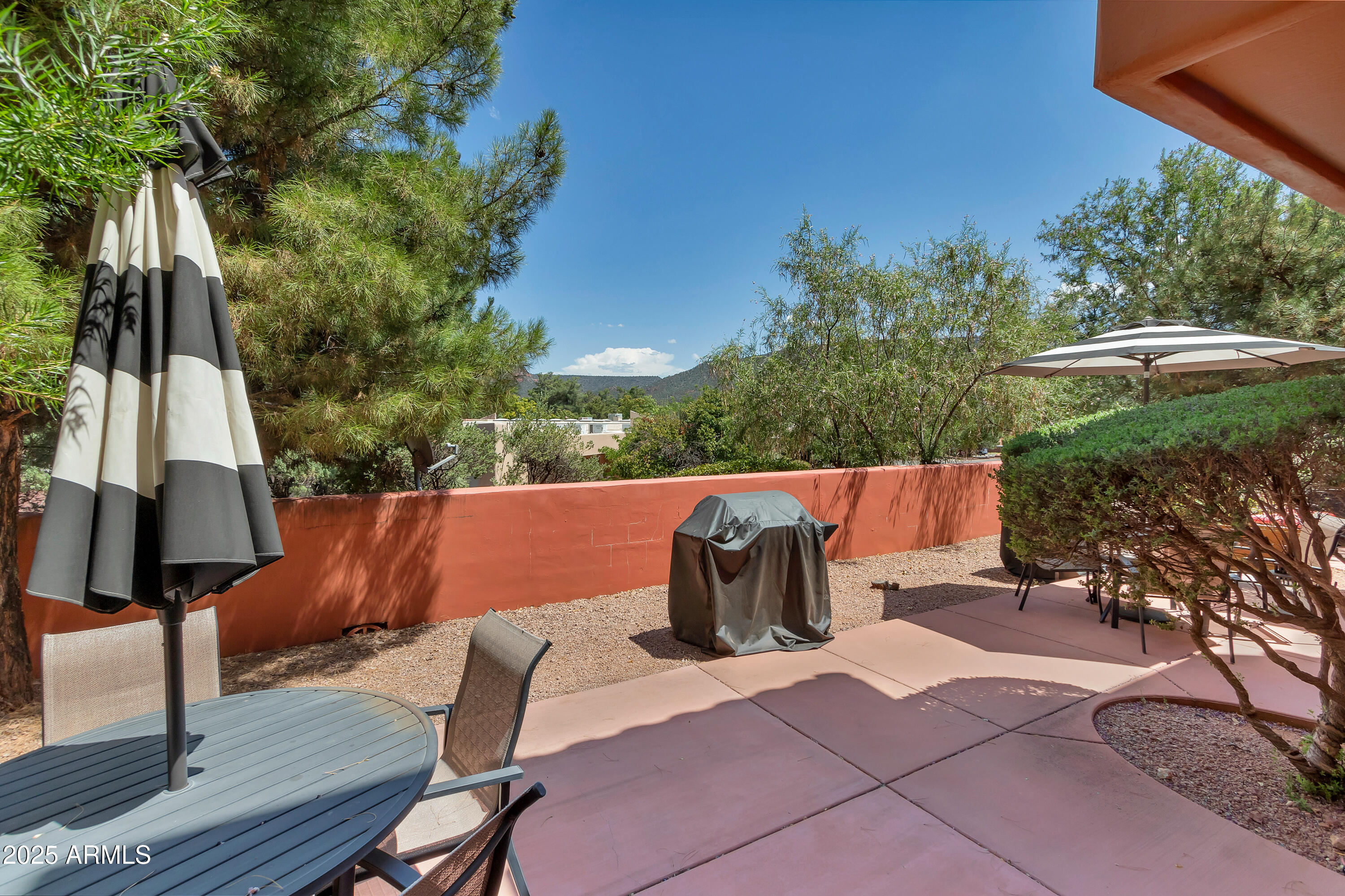 45 Canyon Diablo Road, Unit 5 Sedona, AZ 86351 - Photo 21 of 25 a view of backyard with seating space and trees