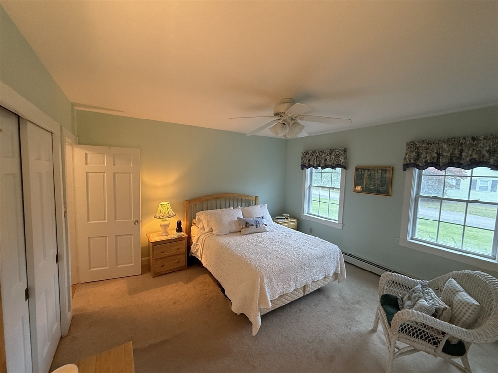 40 Studley Road, Unit 1 Barnstable, MA 02601 - Photo 13 of 24 a bedroom with a bed and window