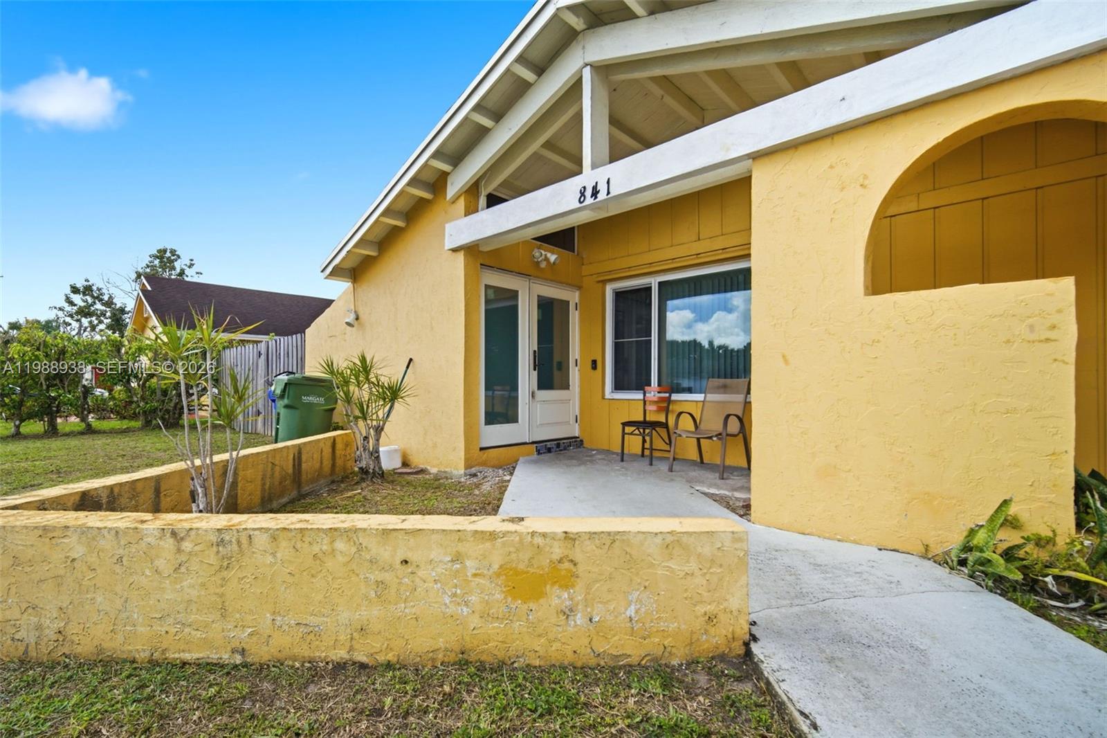841 Southwest 55th Avenue Margate, FL 33068 - Photo 13 of 26 a view of swimming pool with outdoor seating