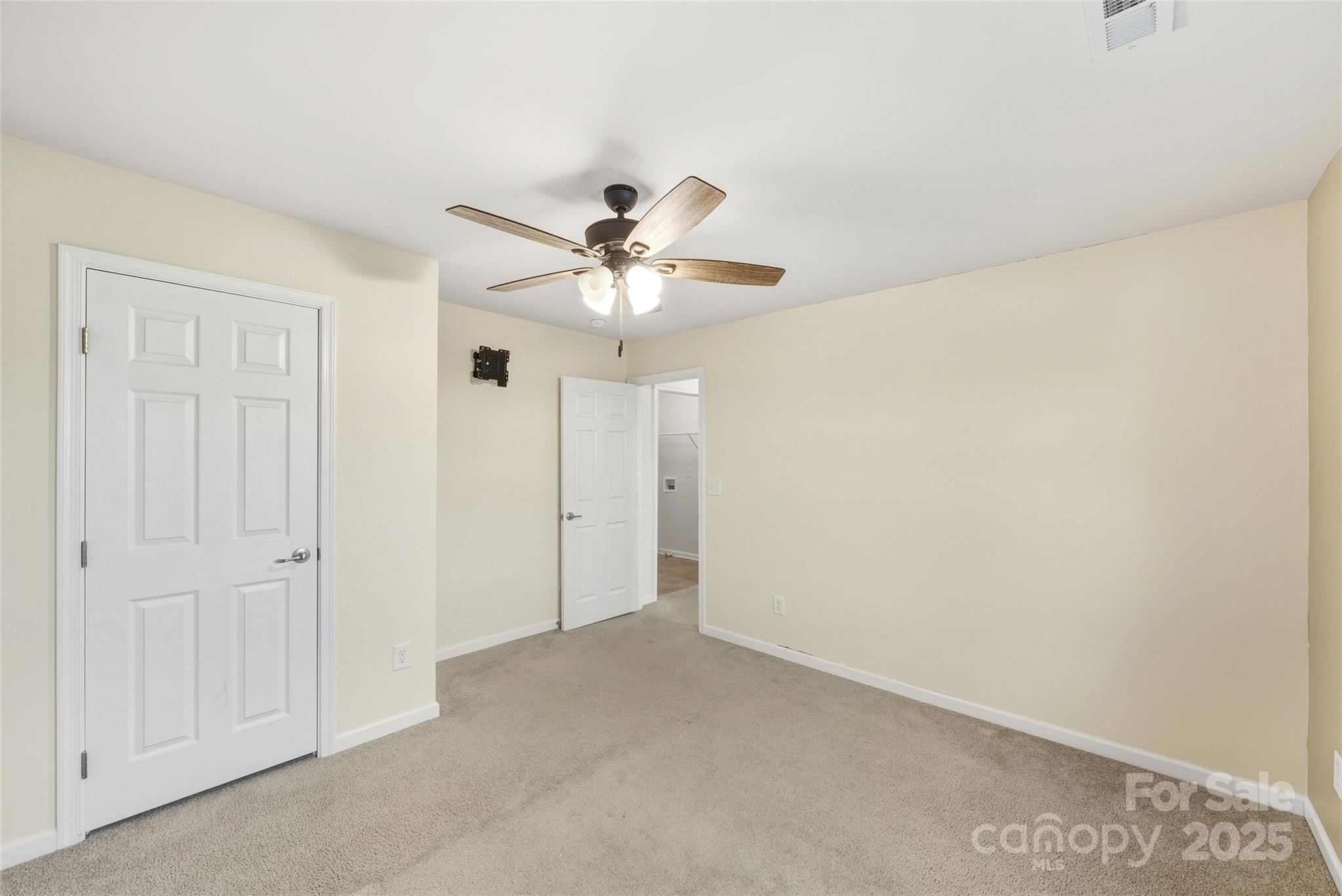 2155 Galloway Lane Southwest Concord, NC 28025 - Photo 32 of 40 a view of a livingroom with a chandelier fan