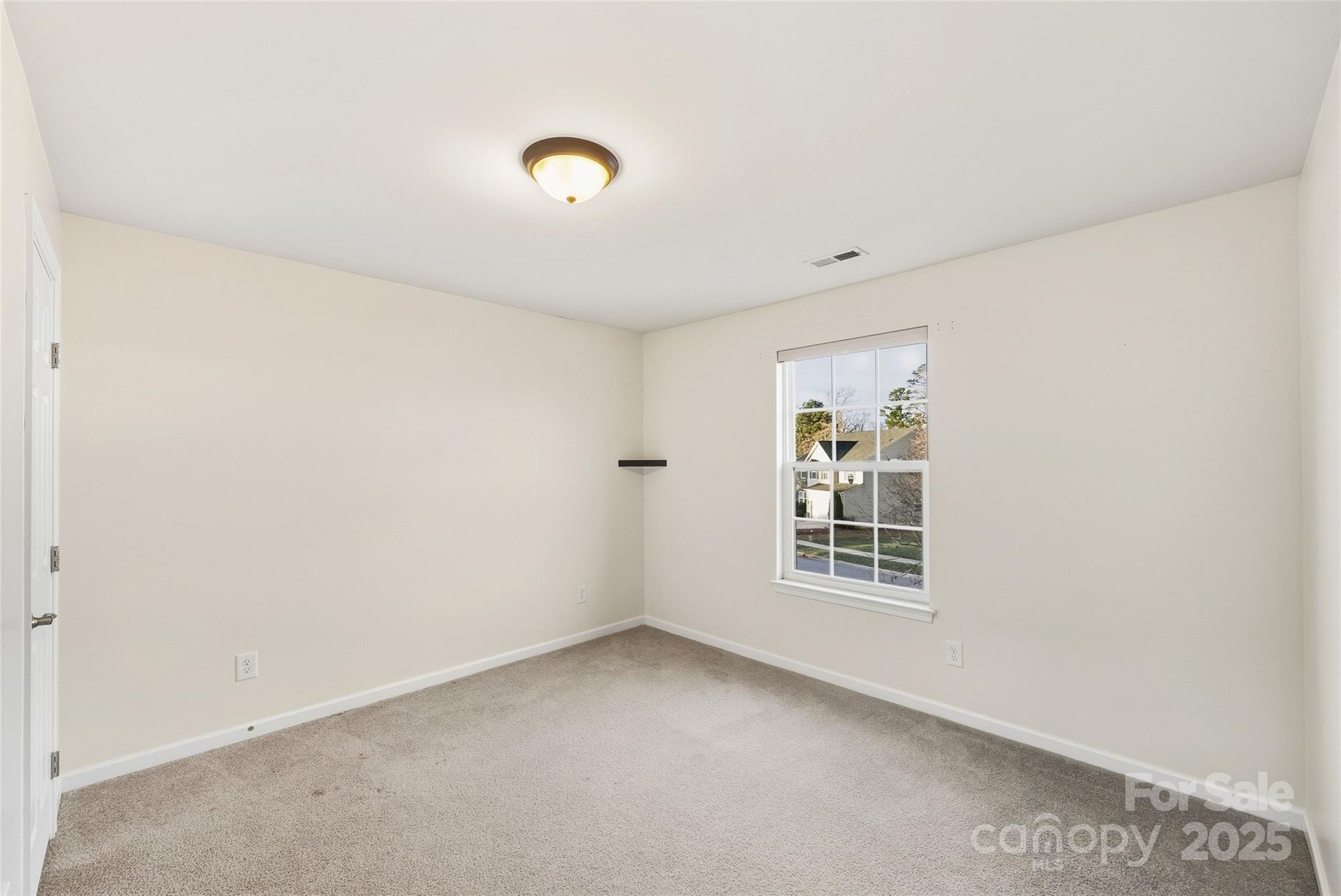 2155 Galloway Lane Southwest Concord, NC 28025 - Photo 33 of 40 a view of an empty room with a window