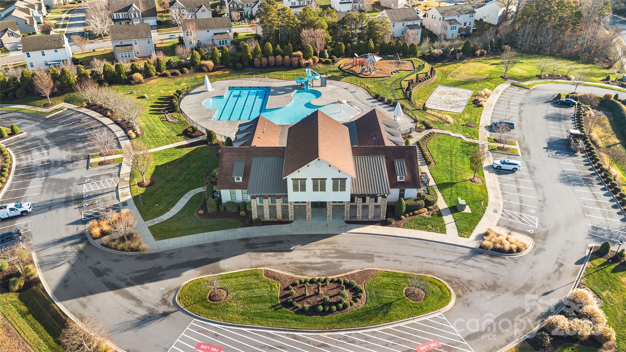 2155 Galloway Lane Southwest Concord, NC 28025 - Photo 39 of 40 an aerial view of a house with swimming pool and large trees