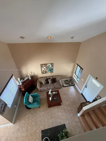 a living room with furniture and a couch