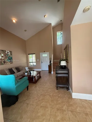 a living room with furniture and a couch