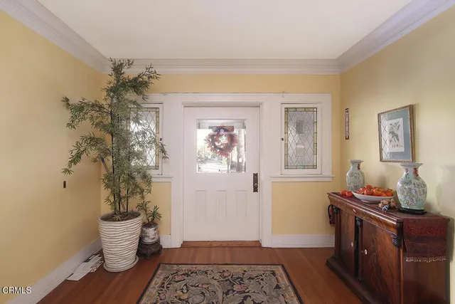 a room with furniture and wooden floor