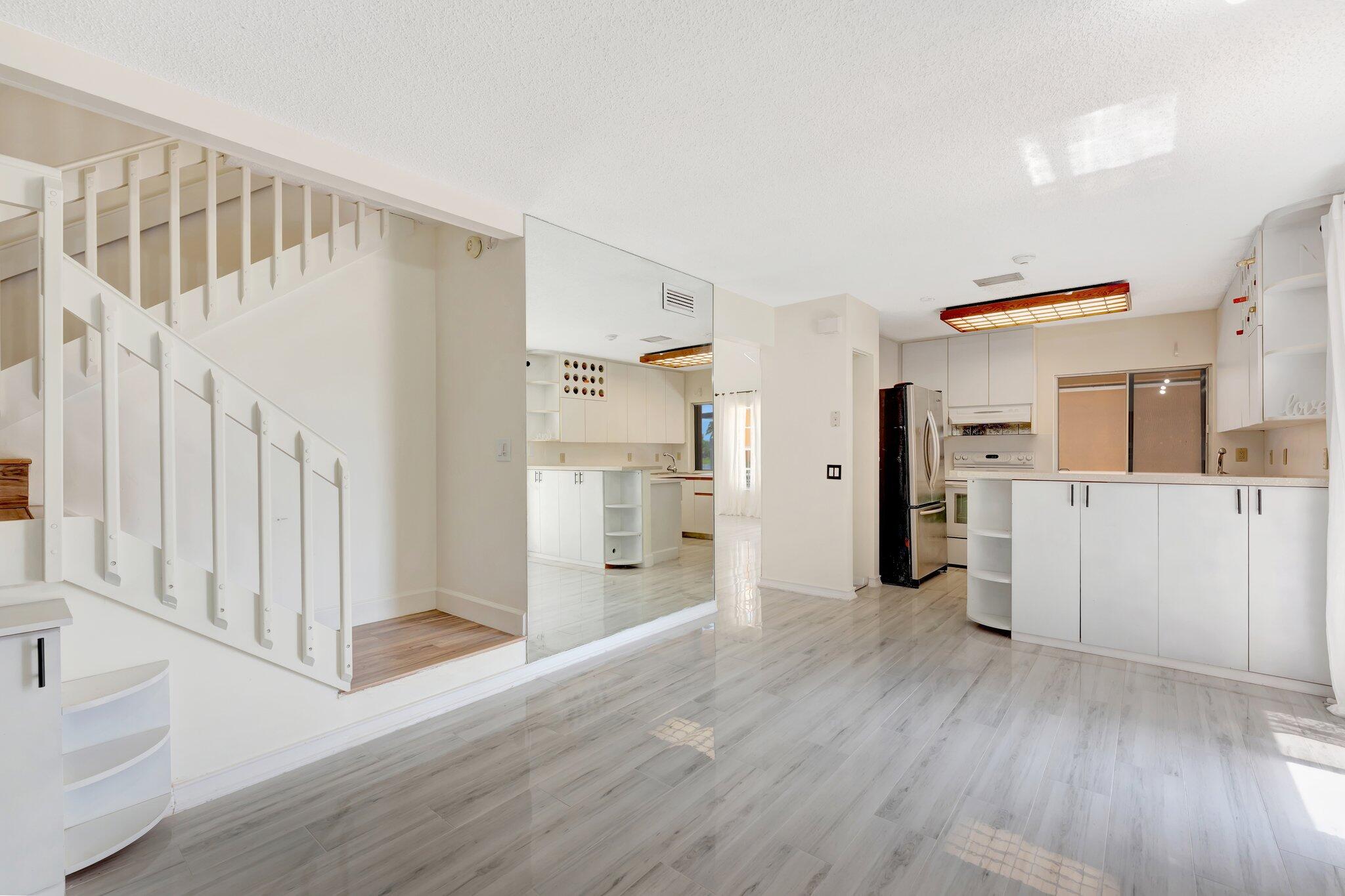 1388 Garden Road Weston, FL 33326 - Photo 14 of 46 Kitchen and upstairs