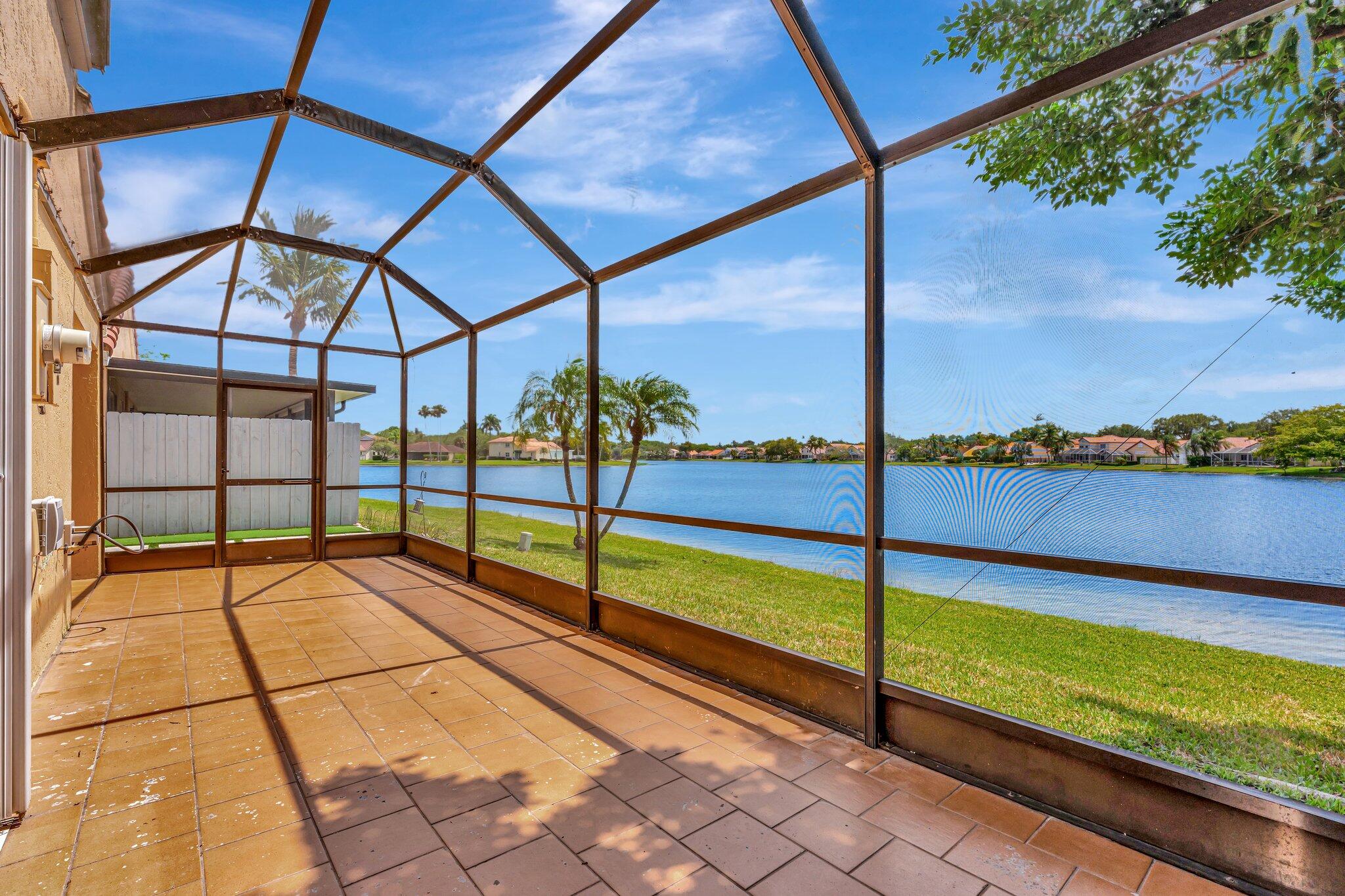 1388 Garden Road Weston, FL 33326 - Photo 18 of 46 Screened in patio