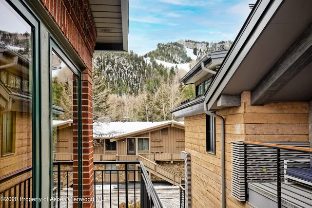 a view of a house with a large window