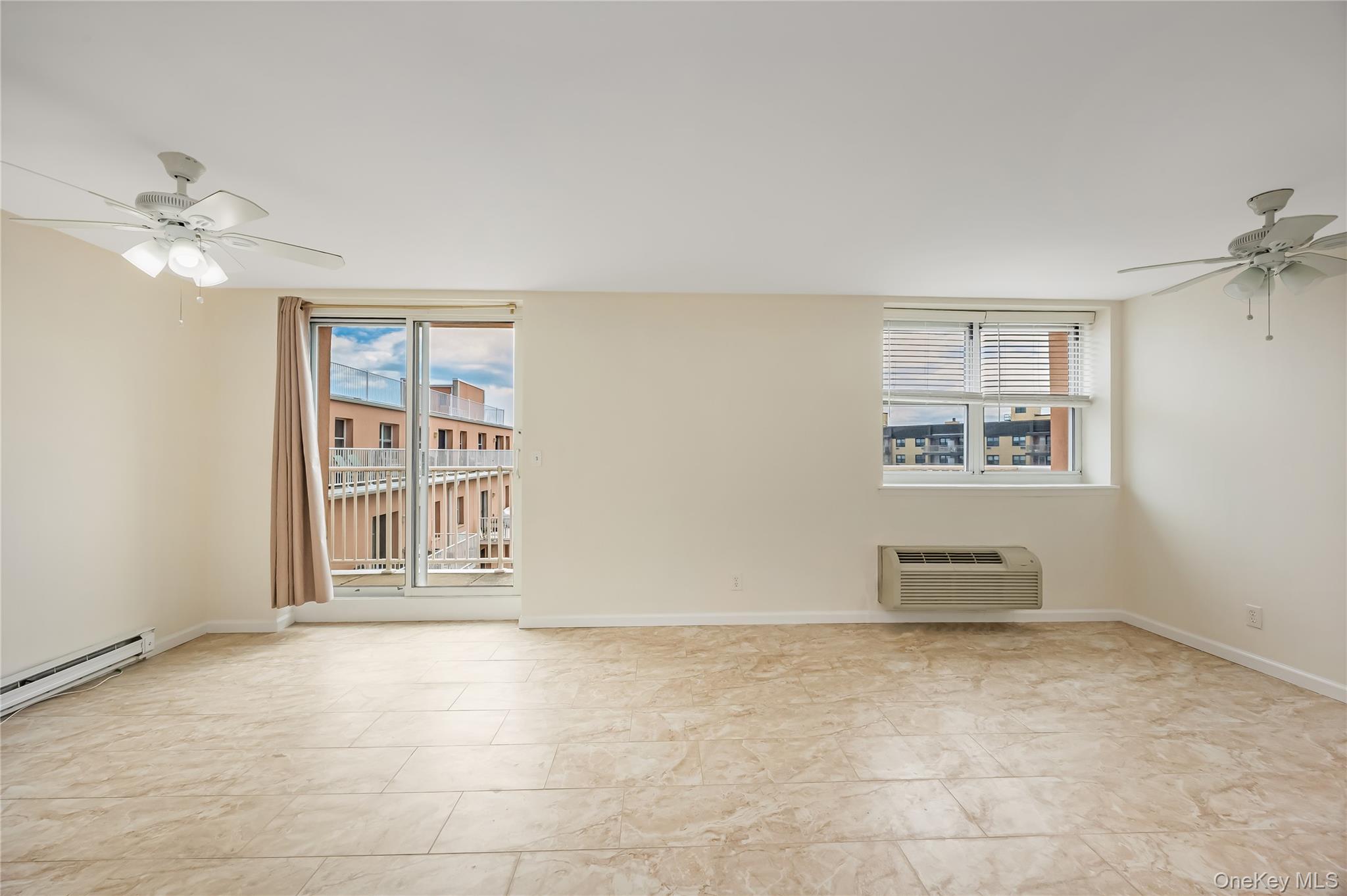 2 Richmond Road, Unit 6M Lido Beach, NY 11561 - Photo 16 of 21 a view of an empty room with a window