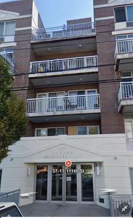 a view of a roof with sitting area