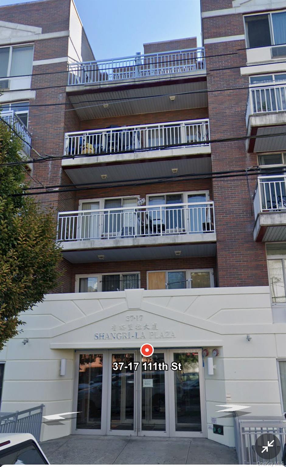 37-17 111th Street, Unit 2D Queens, NY 11368 - Photo 1 of 8 a view of a roof with sitting area